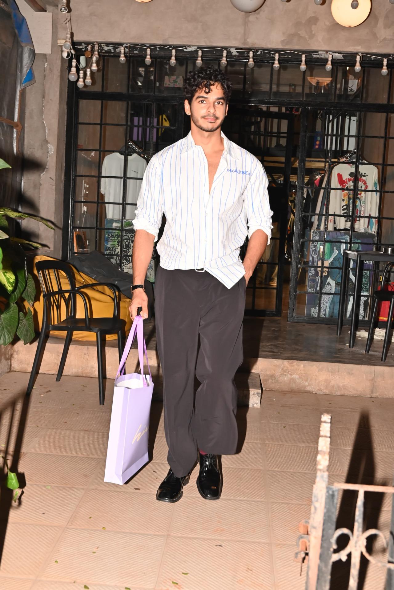 Ishaan Khatter was spotted outside a store in Bandra. He opted for a slightly format yet stylish look. He wore a light blue shirt and paired it with loose black trousers. 
